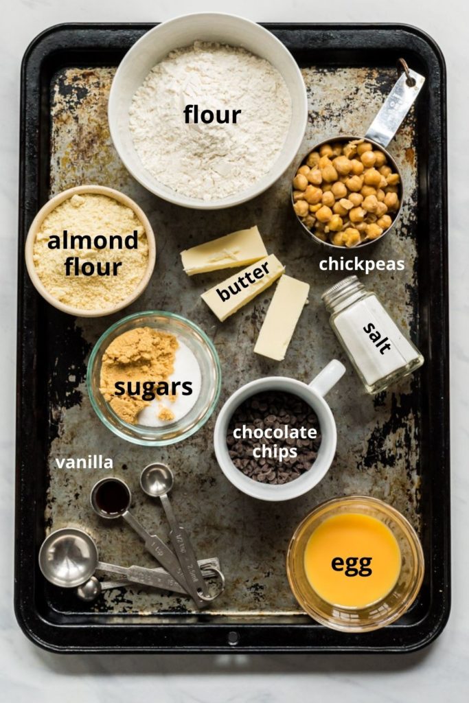 Ingredients in chocolate chips cookie dough bites: flour, sugars, chickpeas, eggs, butter, salt, chocolate chips, and vanilla.